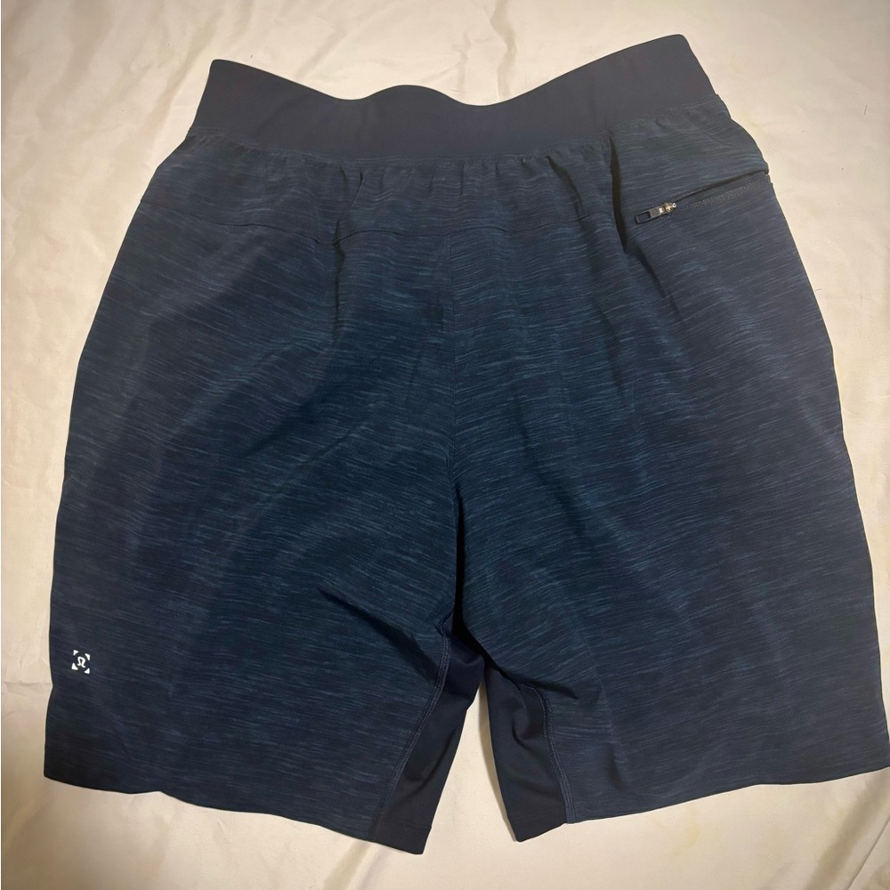 Heathered blue/black license to train medium lululemon shorts